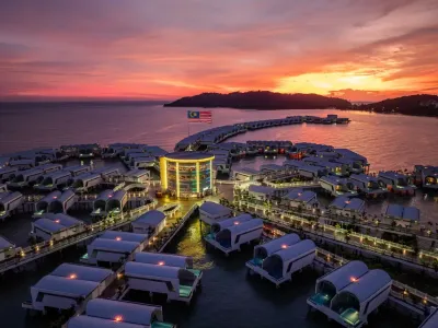 Aerial view of Lexis Hibiscus Port Dickson with Malaysian flag