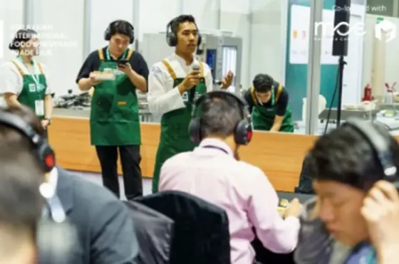 Food cooking demonstration at MIFB, with judges sampling food - Imperial Lexis Kuala Lumpur