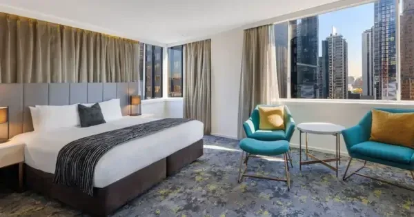 Contemporary suite with skyline views at Hotel Grand Chancellor Melbourne