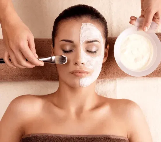 Face mask applied by a brush to a guest on a table at Oregon Garden Resort, a top choice hotel in Silverton