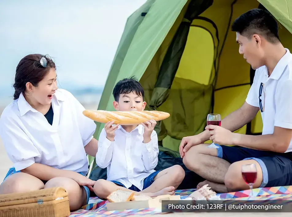 A family enjoying their time on the beach - Lexis Hibiscus