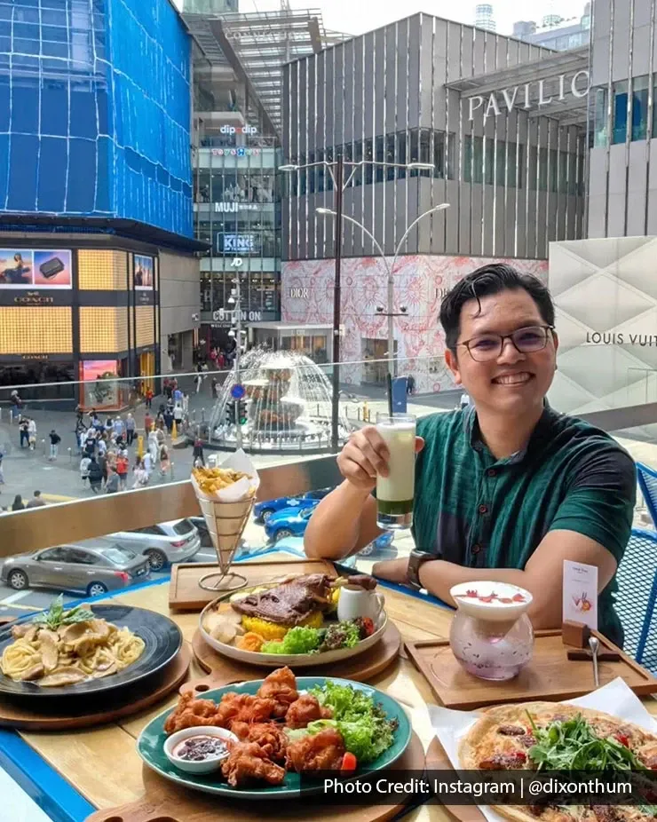Diner enjoying a meal overlooking Pavilion Kuala Lumpur