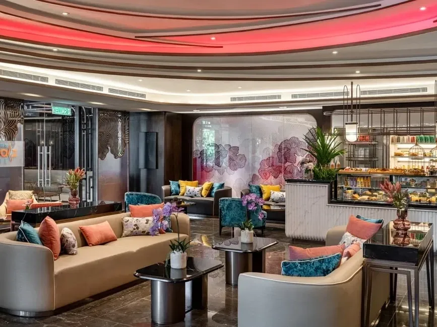 Vibrant and comfortable lounge seating with colorful cushions at Coralz Cafe in Imperial Lexis KL.
