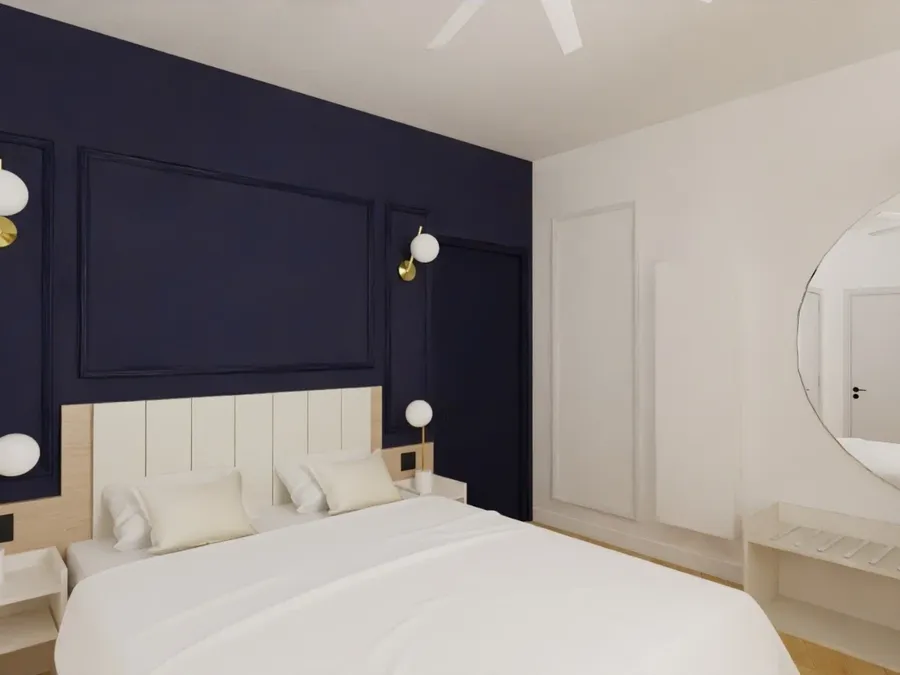 Chambre luxueuse avec lit double et décoration moderne à Les Sources Callou, Vichy.