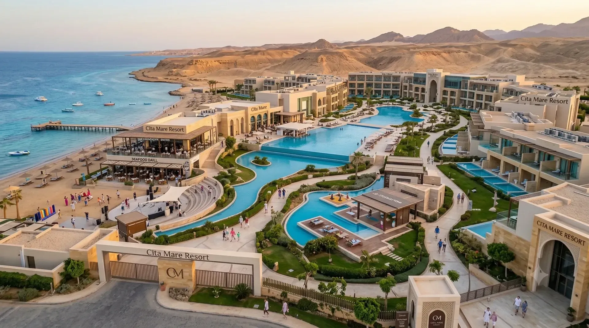 Aerial view of Cita Mare Resort&rsquo;s lagoon pools winding down to the beach