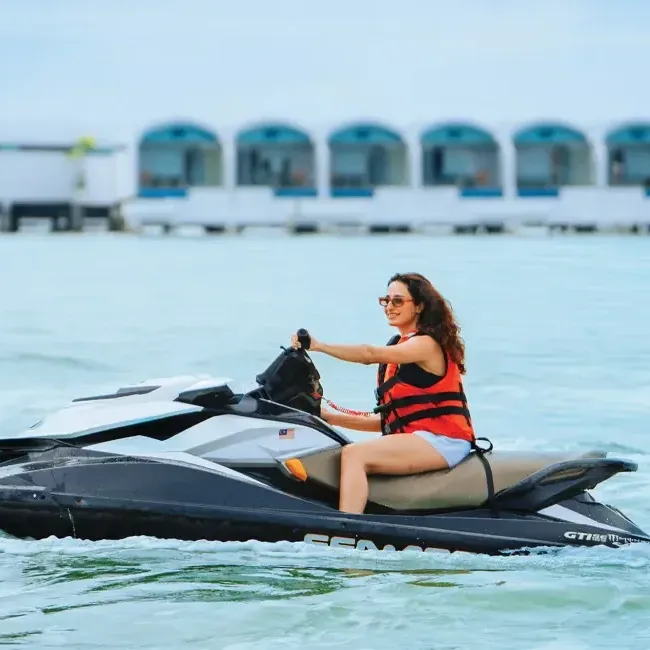 A woman enjoying the jet ski ride at Lexis Hibiscus Port Dickson - Lexis Hotels & Resorts