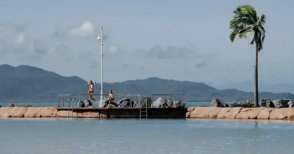 People swimming near The Strand, Townsville.
