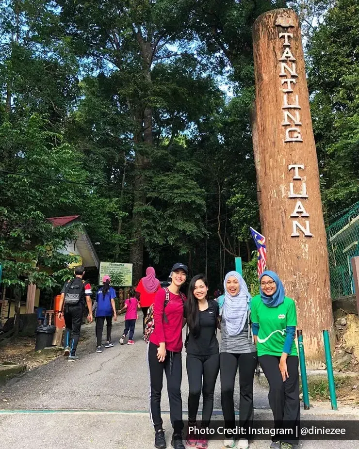 A group of friends taking a photo together at a family-friendly spot - Lexis MY