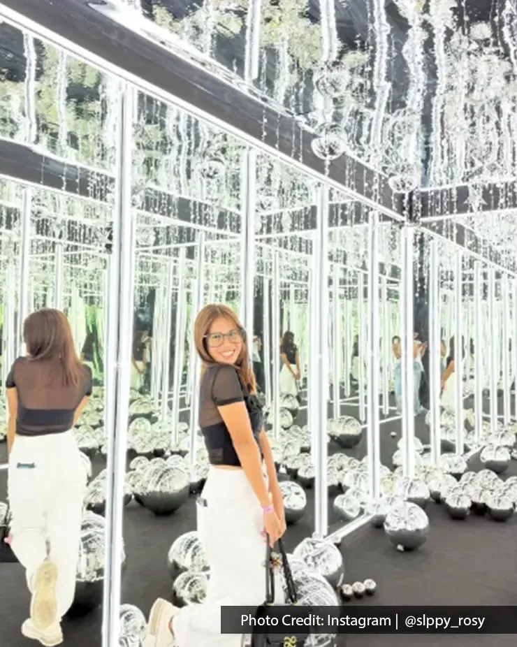 Immersive mirror room filled with reflections and lights at Glow Planet Penang