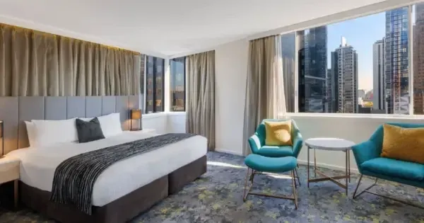 Interior room with view of Melbourne CBD at Hotel Grand Chancellor Melbourne