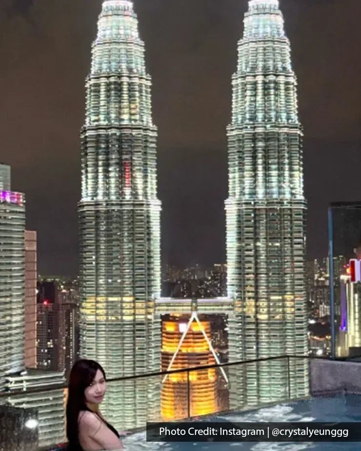 Guest enjoying the Level 51 infinity pool at Imperial Lexis Kuala Lumpur