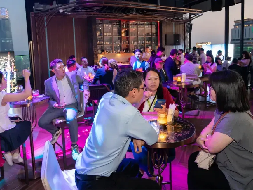 Guests gathered at tables in the Satellite Restaurant and Bar at Imperial Lexis Kuala Lumpur - Lexis Hotel Group
