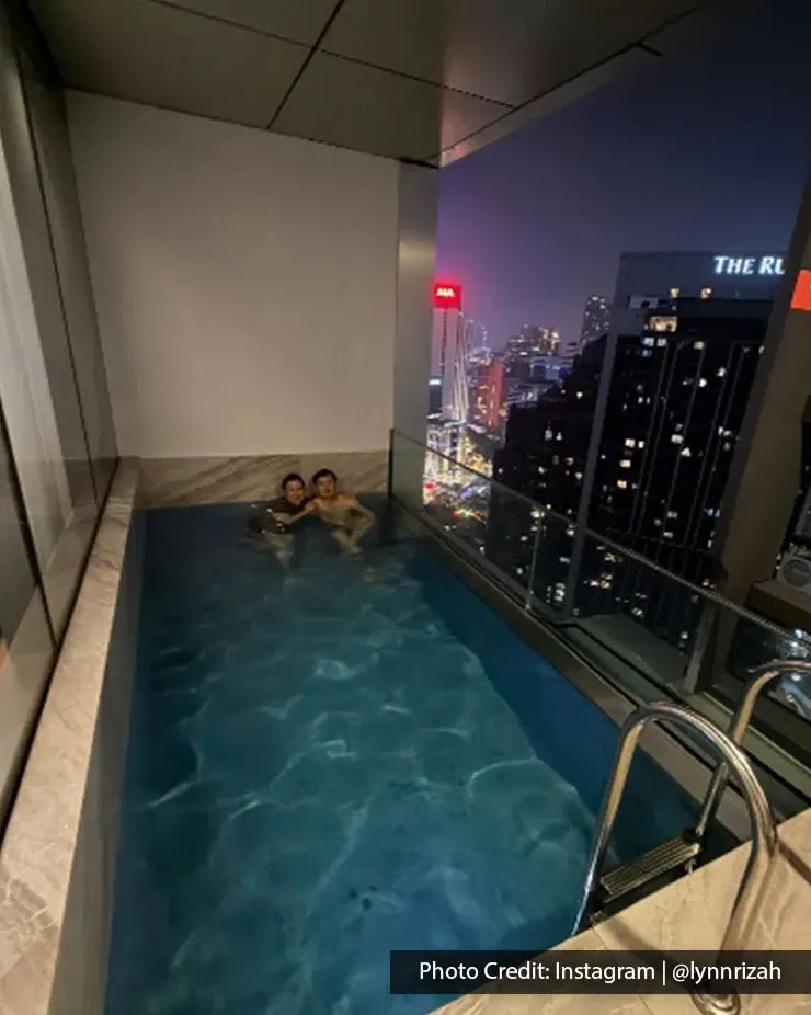 Indoor private pool at Imperial Lexis KL after dark
