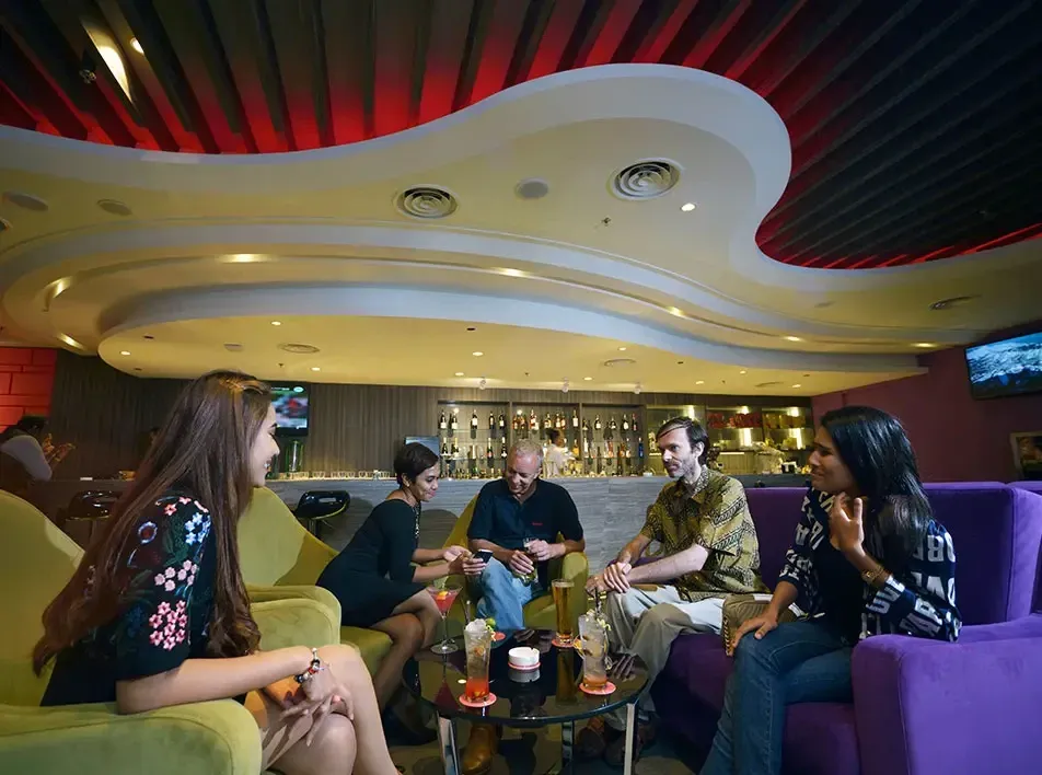 Group of friends enjoy dining at Satellite Restaurant & Bar.