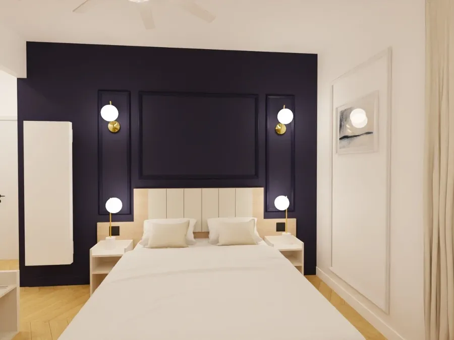 Chambre élégante avec lit double, murs violets et éclairage moderne à Les Sources Callou.