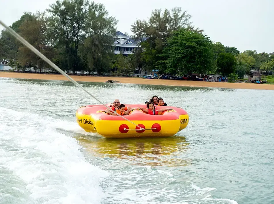 A group of people enjoying water activities - Lexis Hibiscus