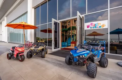 Kidz world entrance with electric cars outside – Lexis Hibiscus Port Dickson