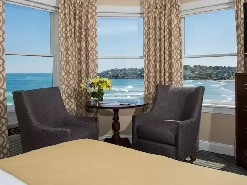 Seating area of King Corner East Ocean Front View with Deck at Union Bluff Hotel