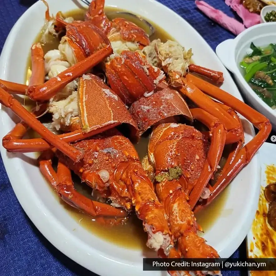 Steamed lobster dish served with savory sauce at Hai Boey Seafood Restaurant