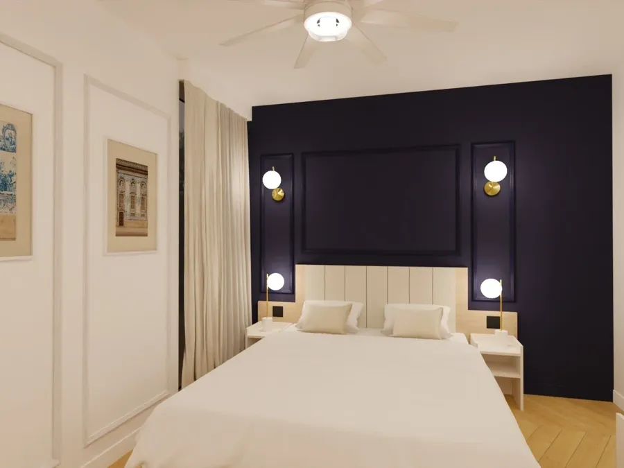 Chambre élégante avec lit double et décoration moderne à l'hôtel Les Sources Callou à Vichy.