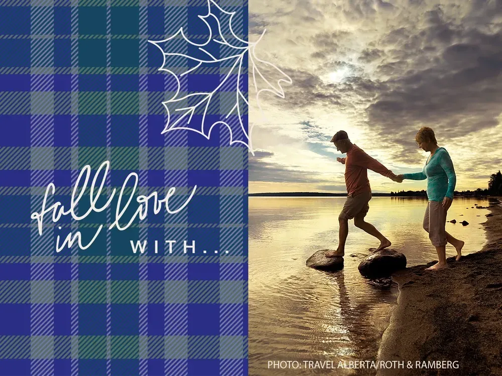 Fall in Love with text on plaid background with an image of an elderly couple by the lake stepping on rocks. Photo courtesy of Travel Alberta, photographer Roth & Ramberg