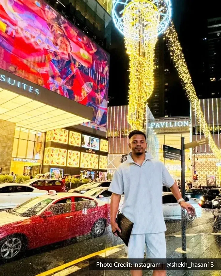 Man enjoying nightlife and shopping along Bukit Bintang city centre