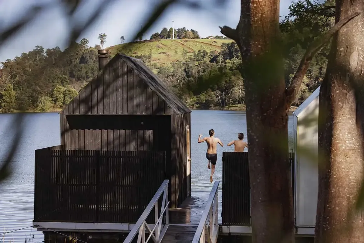 Jumping into Derby Lake at the Floating Sauna