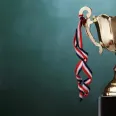 Closeup of a trophy achieved by the club at Grand Coloane
