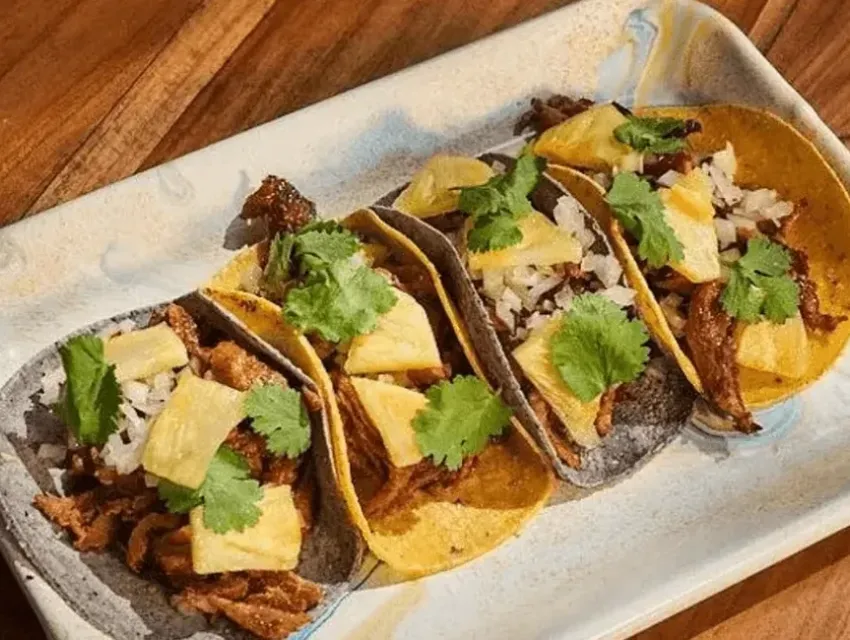 Tacos at Los Félix restaurant in Miami with pineapple and cilantro