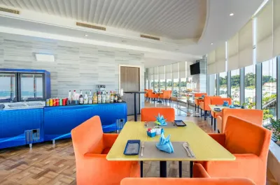 Wave dining with bar setup and waterfront seating – Lexis Hibiscus Port Dickson