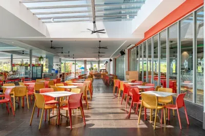 Roselle coffee house with colorful chairs and natural light - Lexis Hibiscus Port Dickson