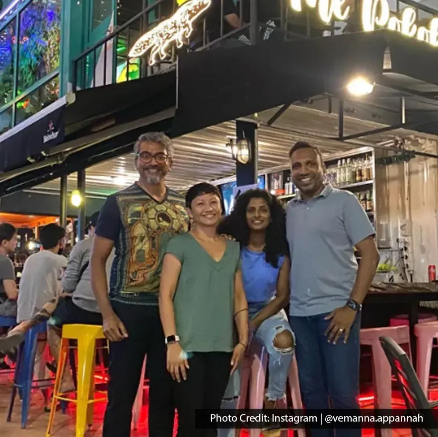 Group of friends posing happily outside The Pokok – All Day Bar.